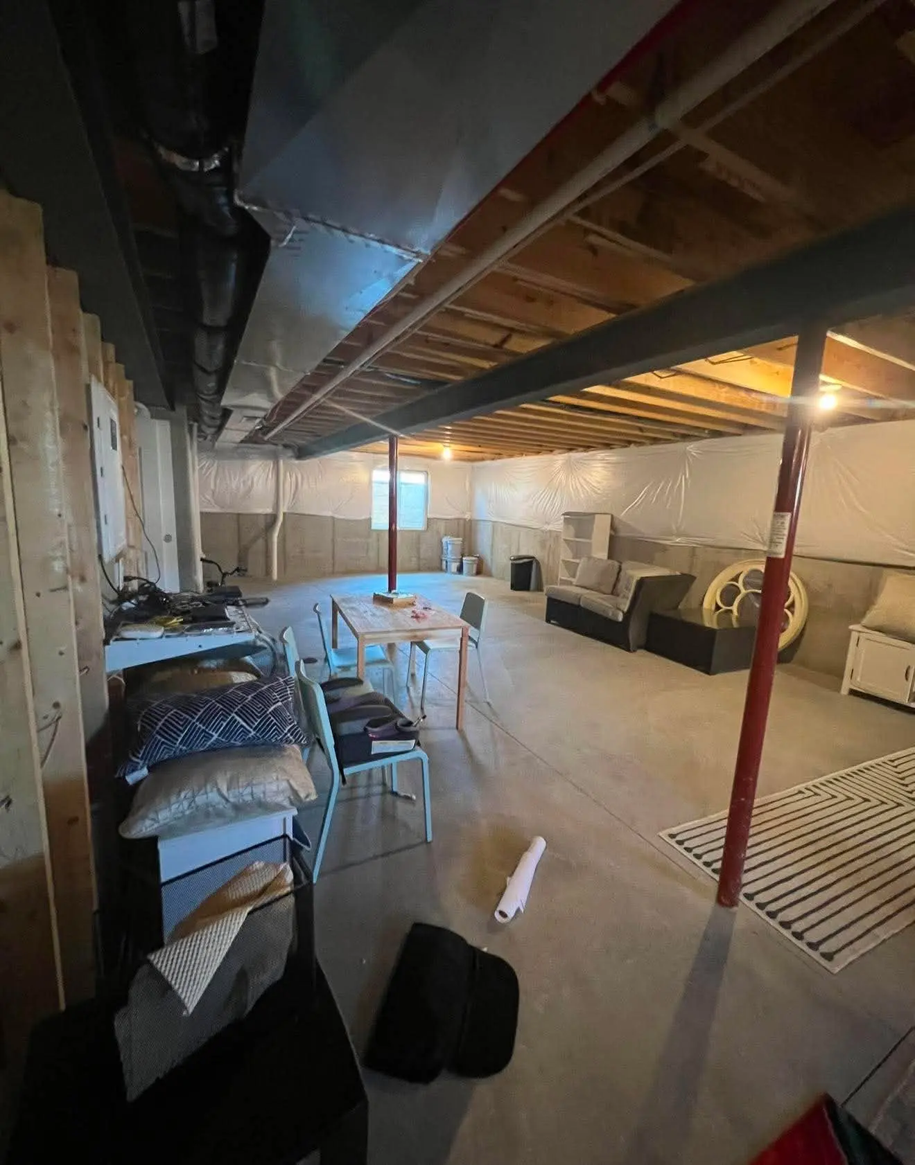 Before: Unfinished basement prior to remodel by R.E.P. General Contracting in Mason, Ohio