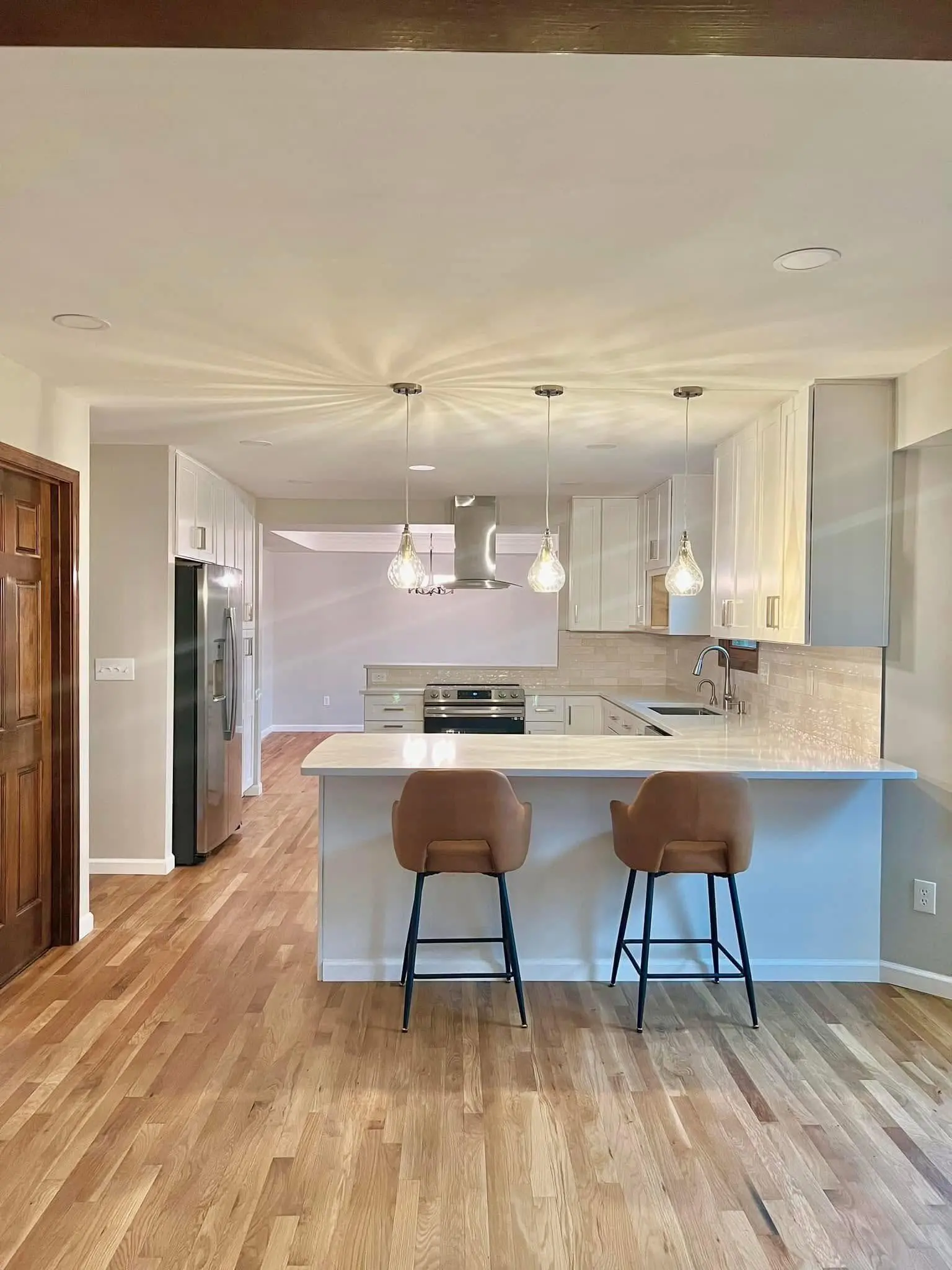 After: Custom kitchen remodel with modern finishes
